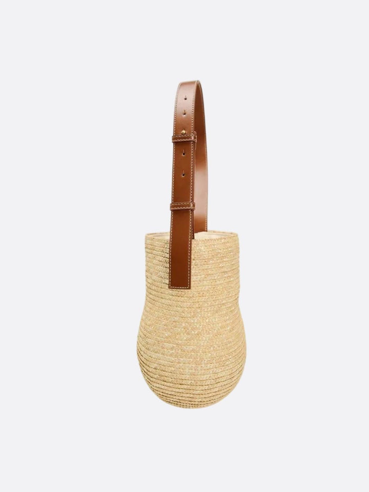 Brown straw and leather bag