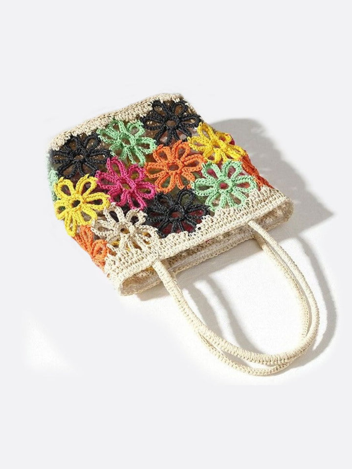 Woven straw bag with flower pattern