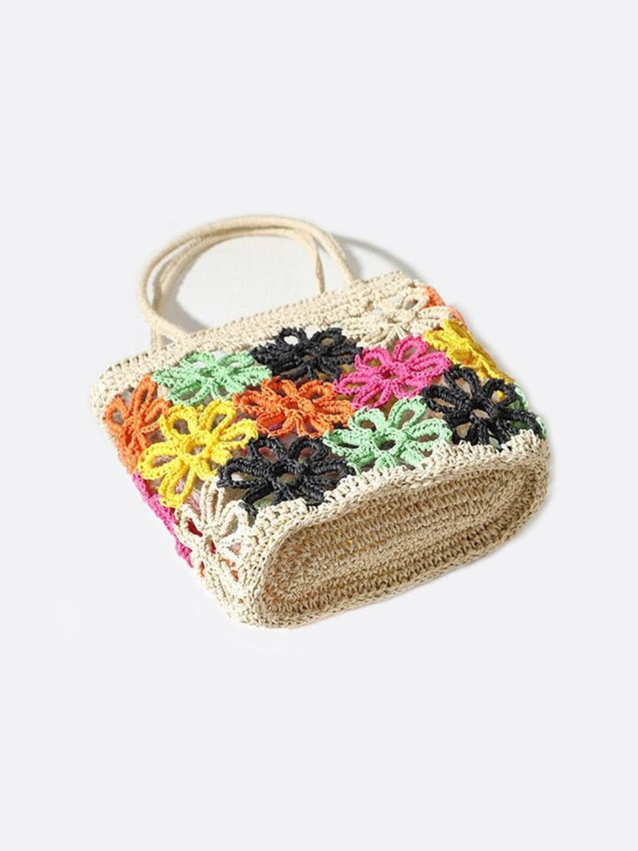 Woven straw bag with flower pattern